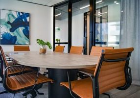 Conference room with orange chairs